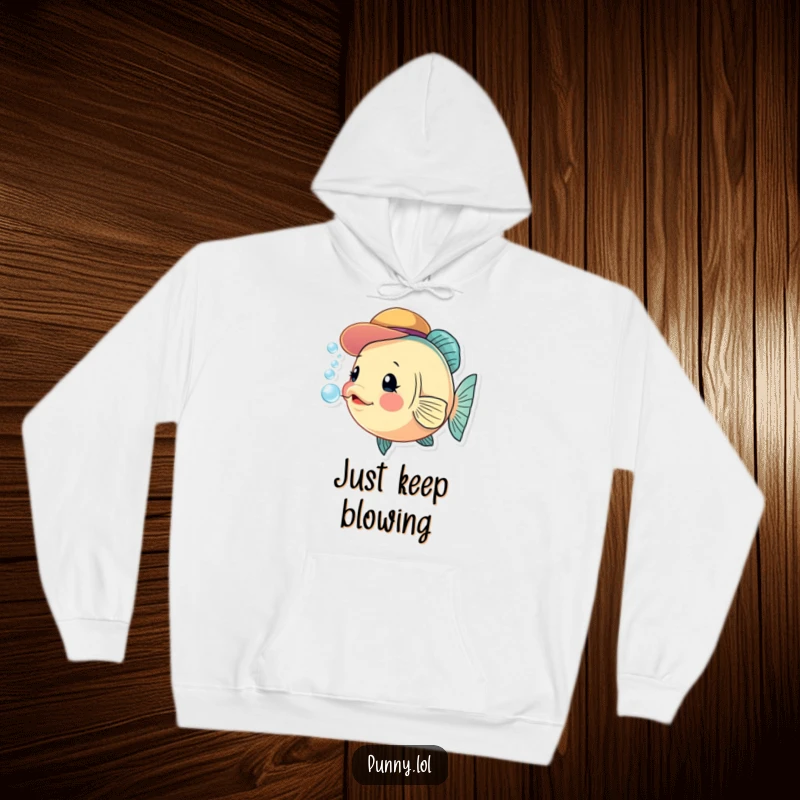 Funny fish hoodie with a tiny hat, exuding curiosity while blowing delightful bubbles, perfect for cozy humor.