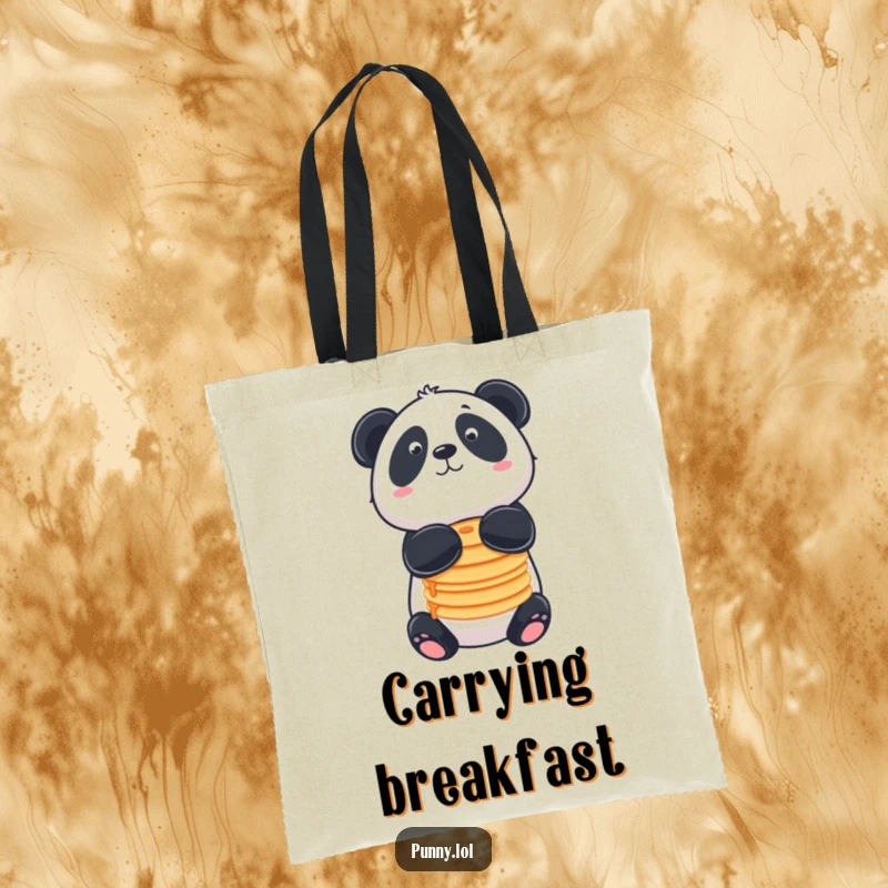 Funny tote bag with a panda balancing pancakes on its nose, great for grocery shopping.