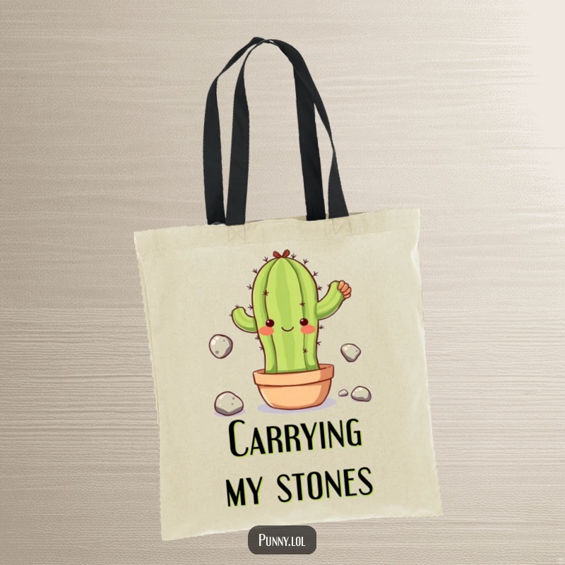Funny tote bag featuring a clumsy cactus character juggling stones, ideal for daily use with a touch of whimsical charm.
