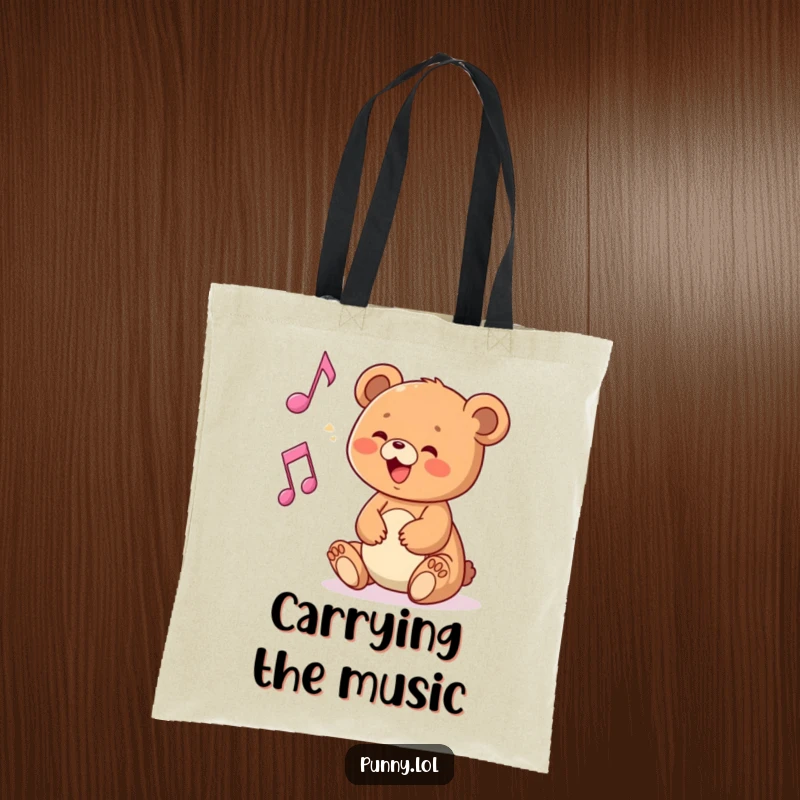Funny tote bag with a bear cub playing with a musical note, great for carrying music essentials.
